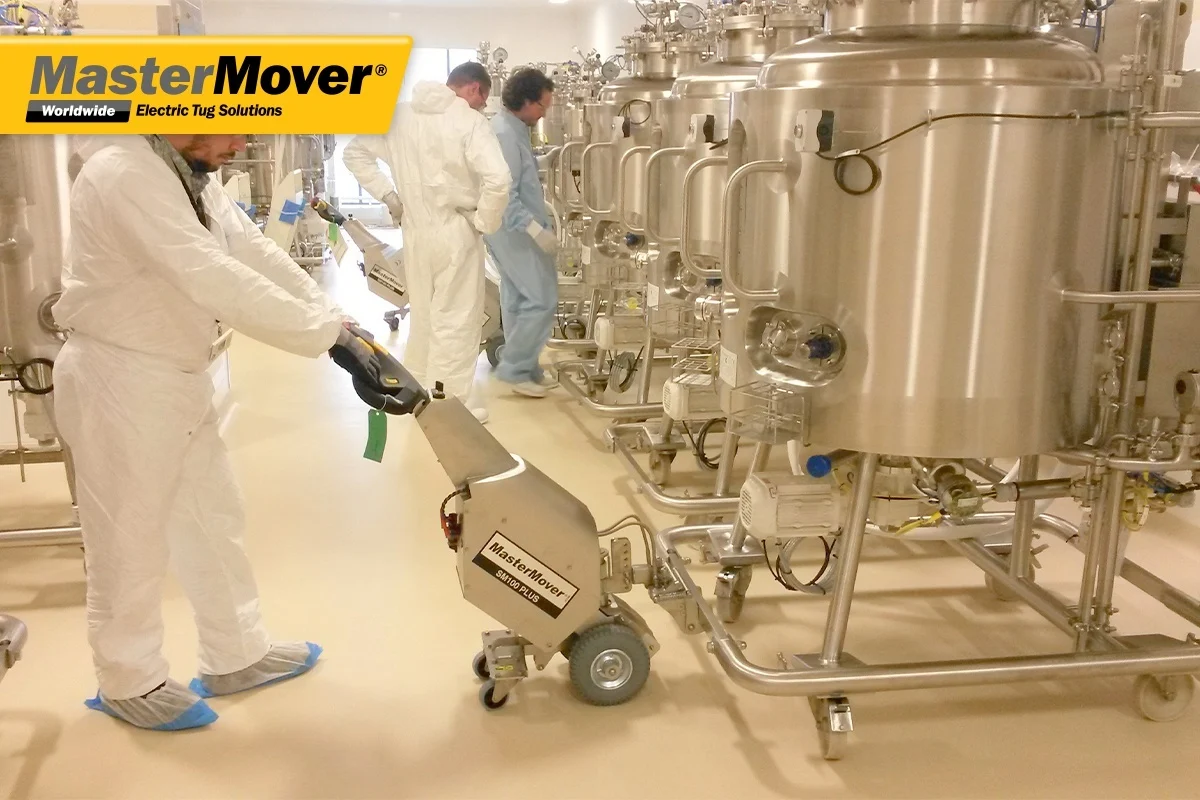 MasterMover SM100+ stainless steel electric tug moving sterile vessels in a pharmaceutical cleanroom